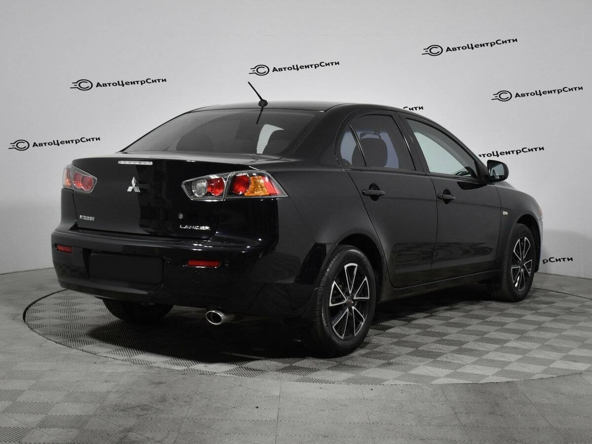 Mitsubishi Lancer с пробегом — 2012 год. Фото: #4
