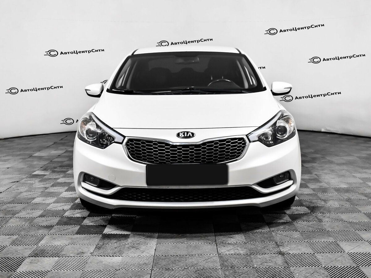 Kia Cerato с пробегом — 2013 год. Фото: #1