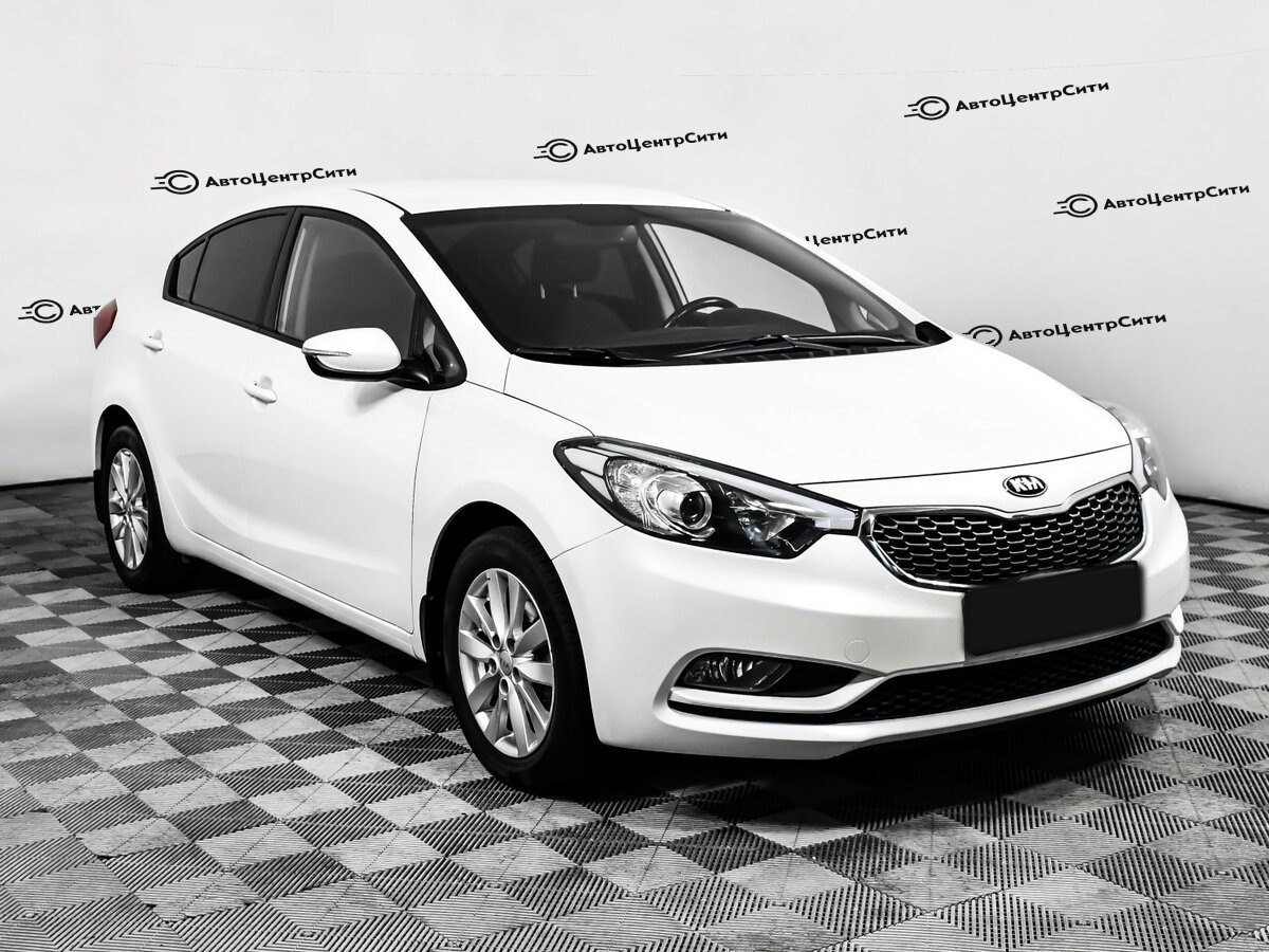 Kia Cerato с пробегом — 2013 год. Фото: #2
