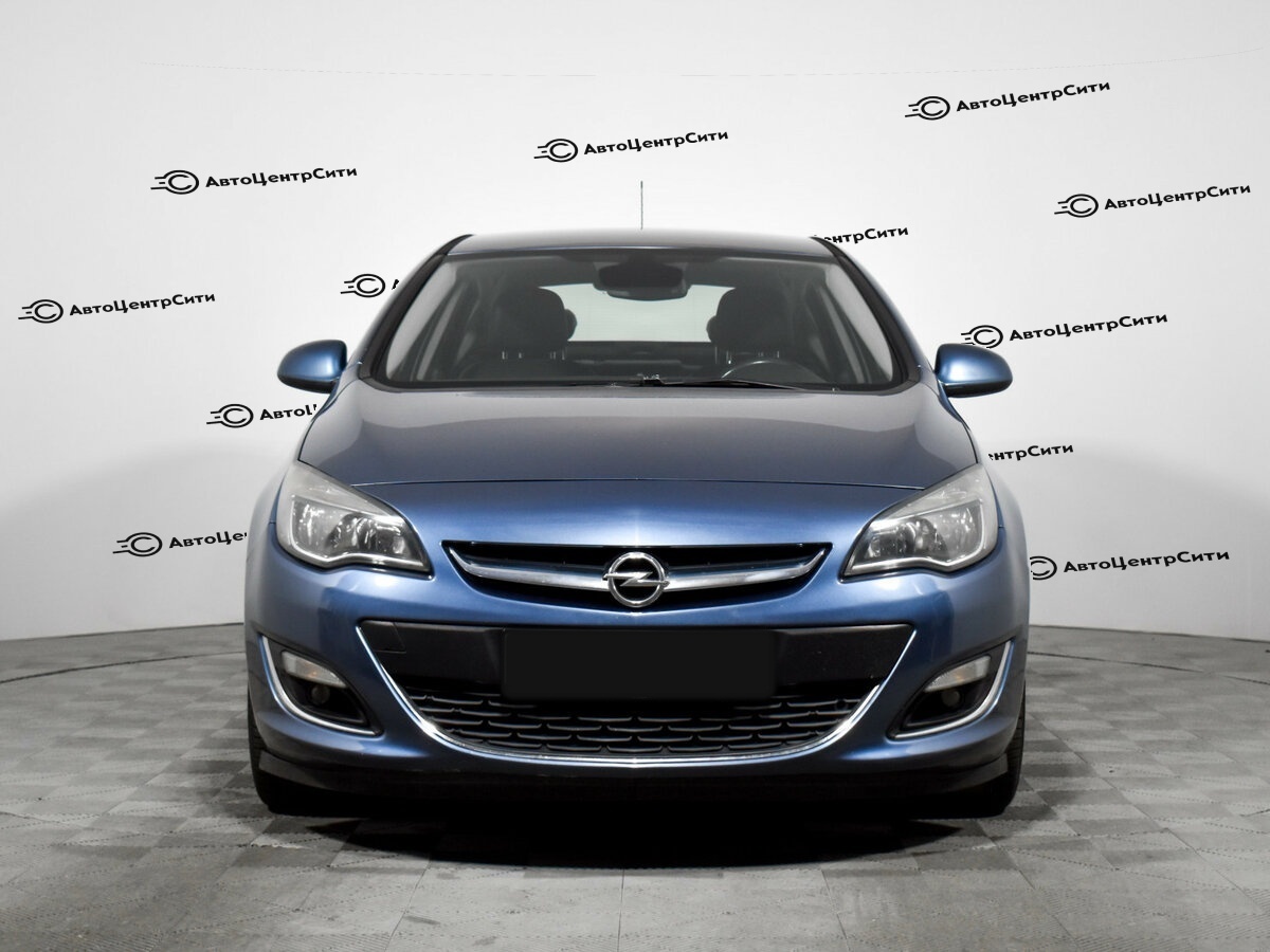 Opel Astra с пробегом — 2013 год. Фото: #1