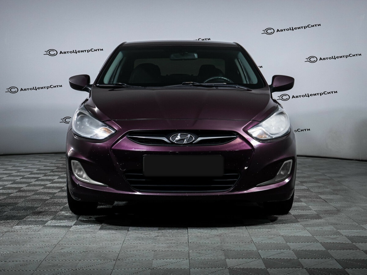 Hyundai Solaris с пробегом — 2013 год. Фото: #1