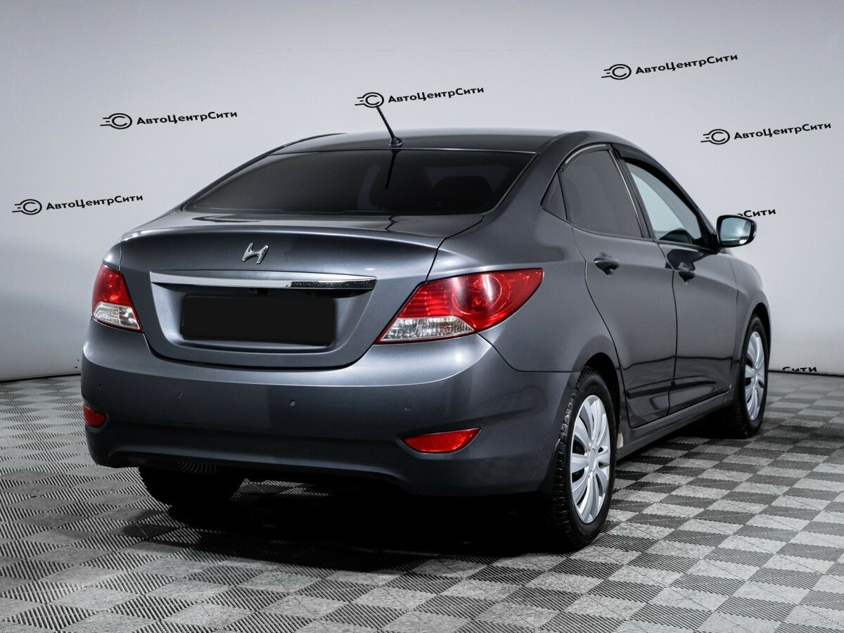 Hyundai Solaris с пробегом — 2012 год. Фото: #3