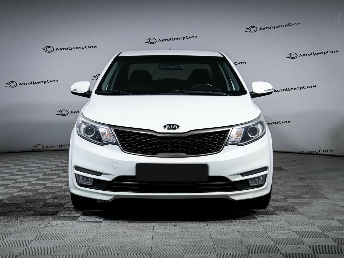 Kia Rio с пробегом — 2015 год. Фото: #1