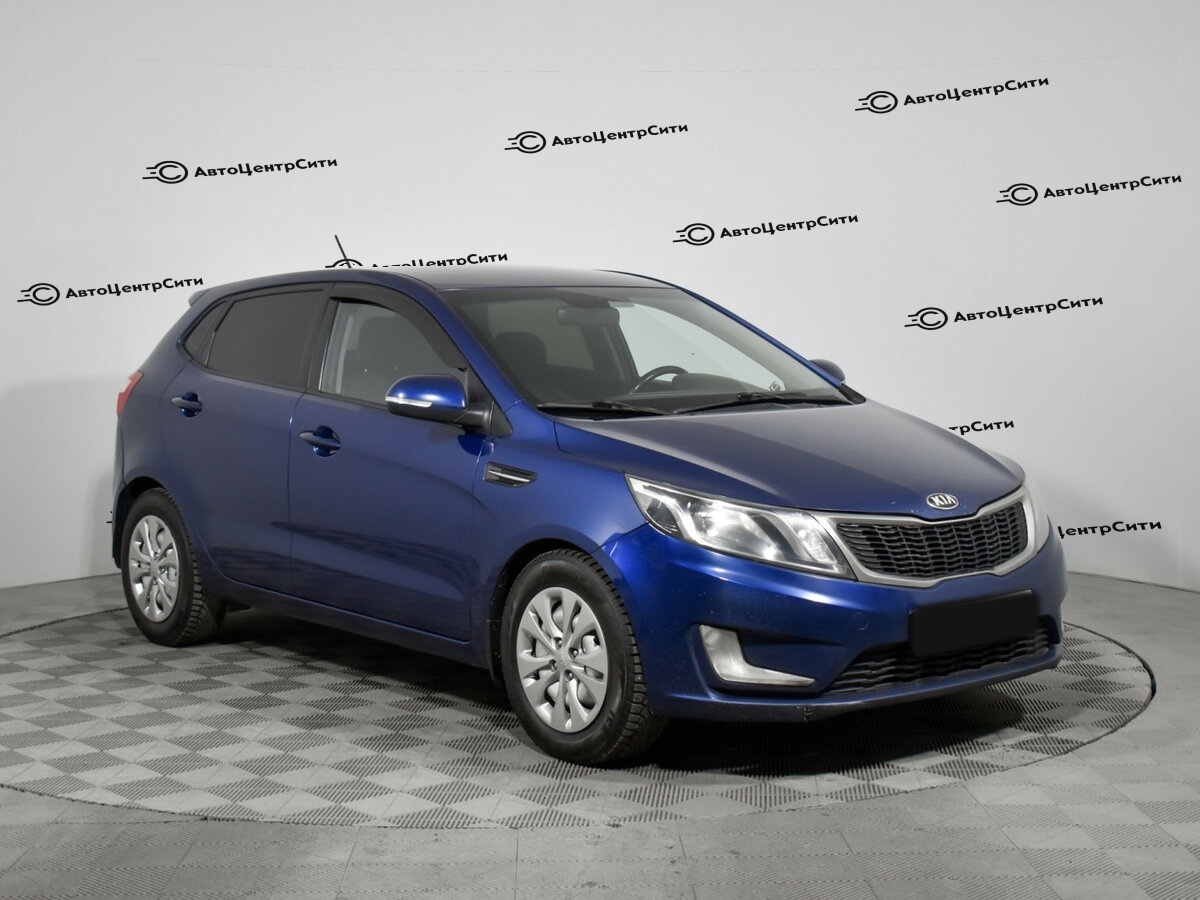 Kia Rio с пробегом — 2014 год. Фото: #2