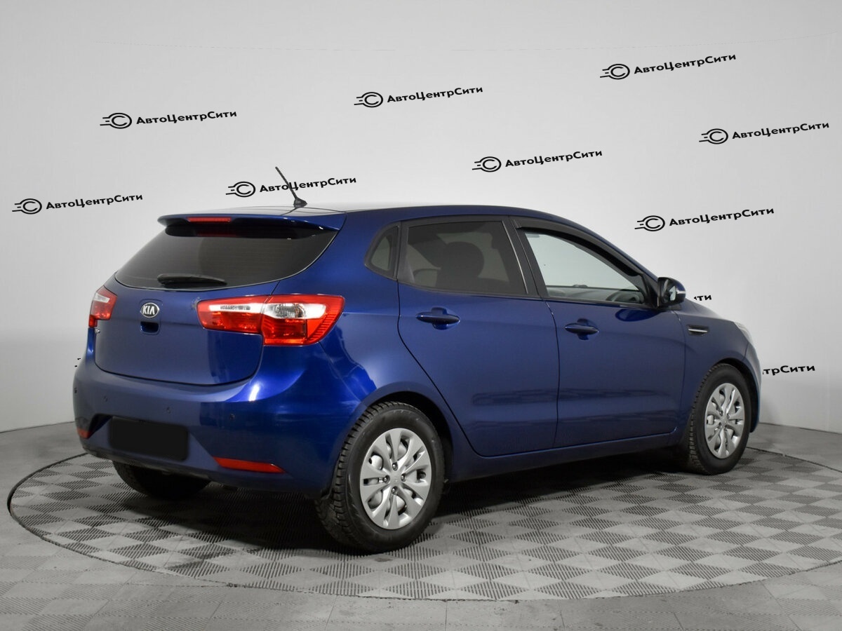 Kia Rio с пробегом — 2014 год. Фото: #4