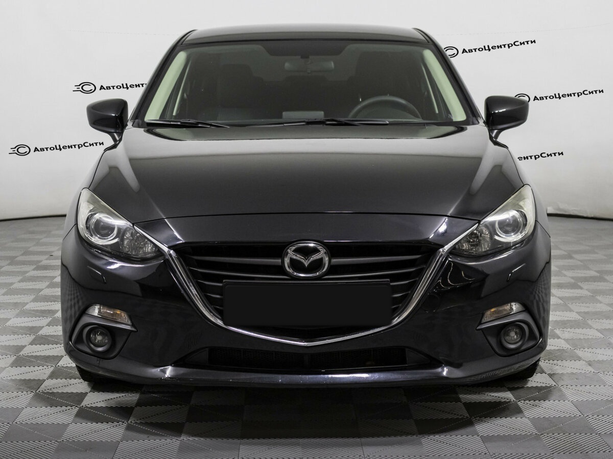 Mazda 3 с пробегом — 2015 год. Фото: #1