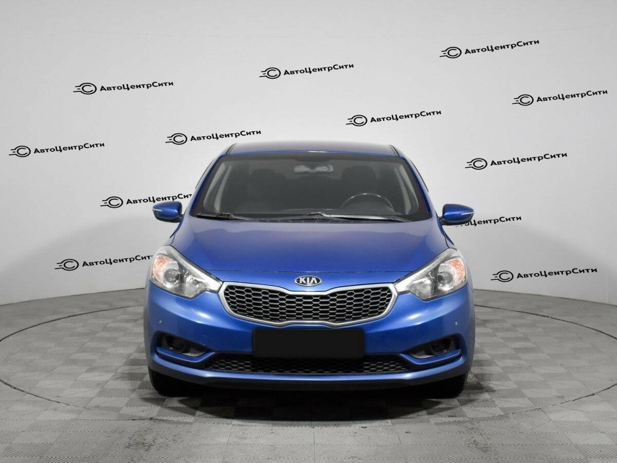 Kia Cerato с пробегом — 2014 год. Фото: #1