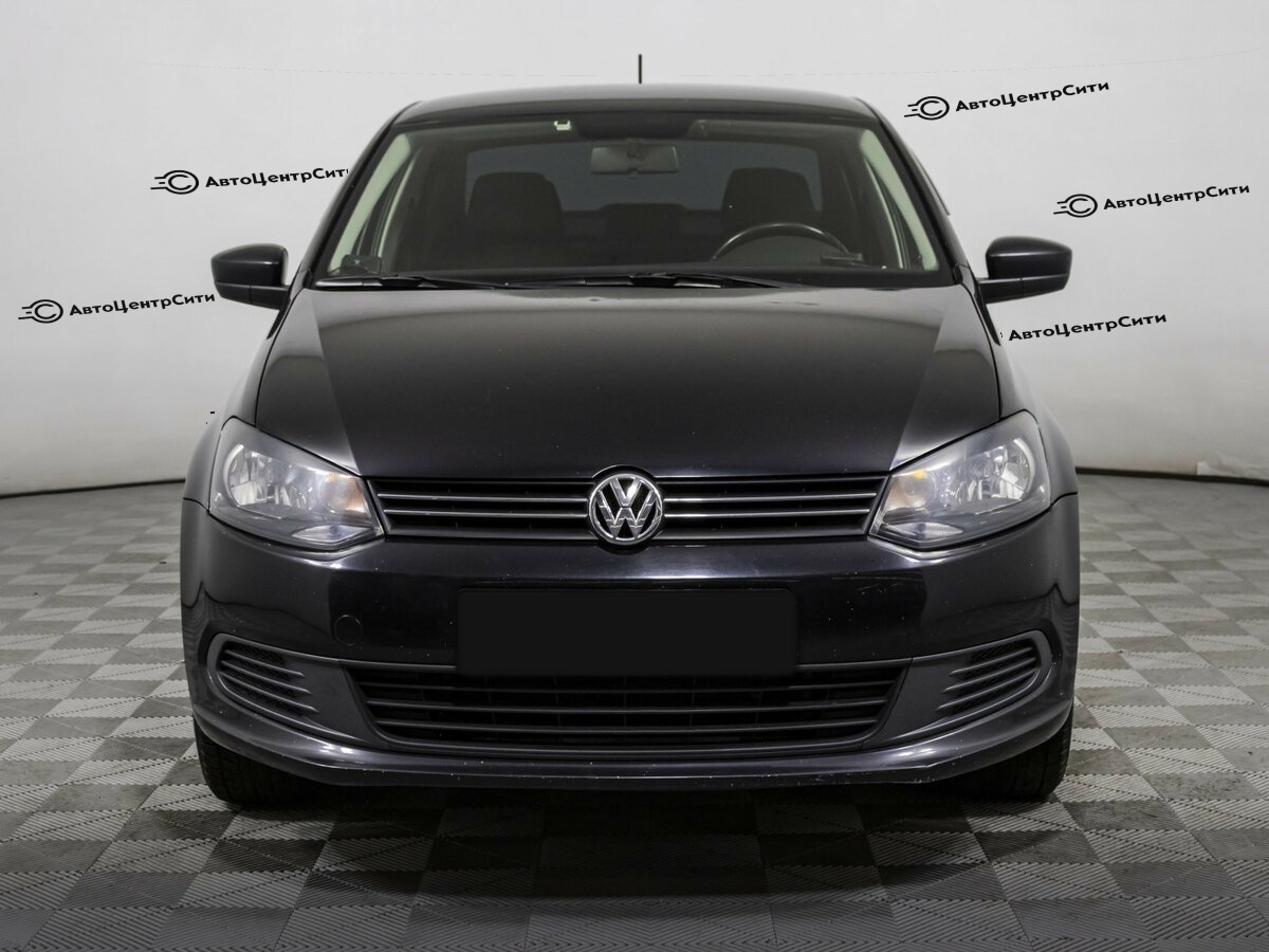 Volkswagen Polo с пробегом — 2014 год. Фото: #1