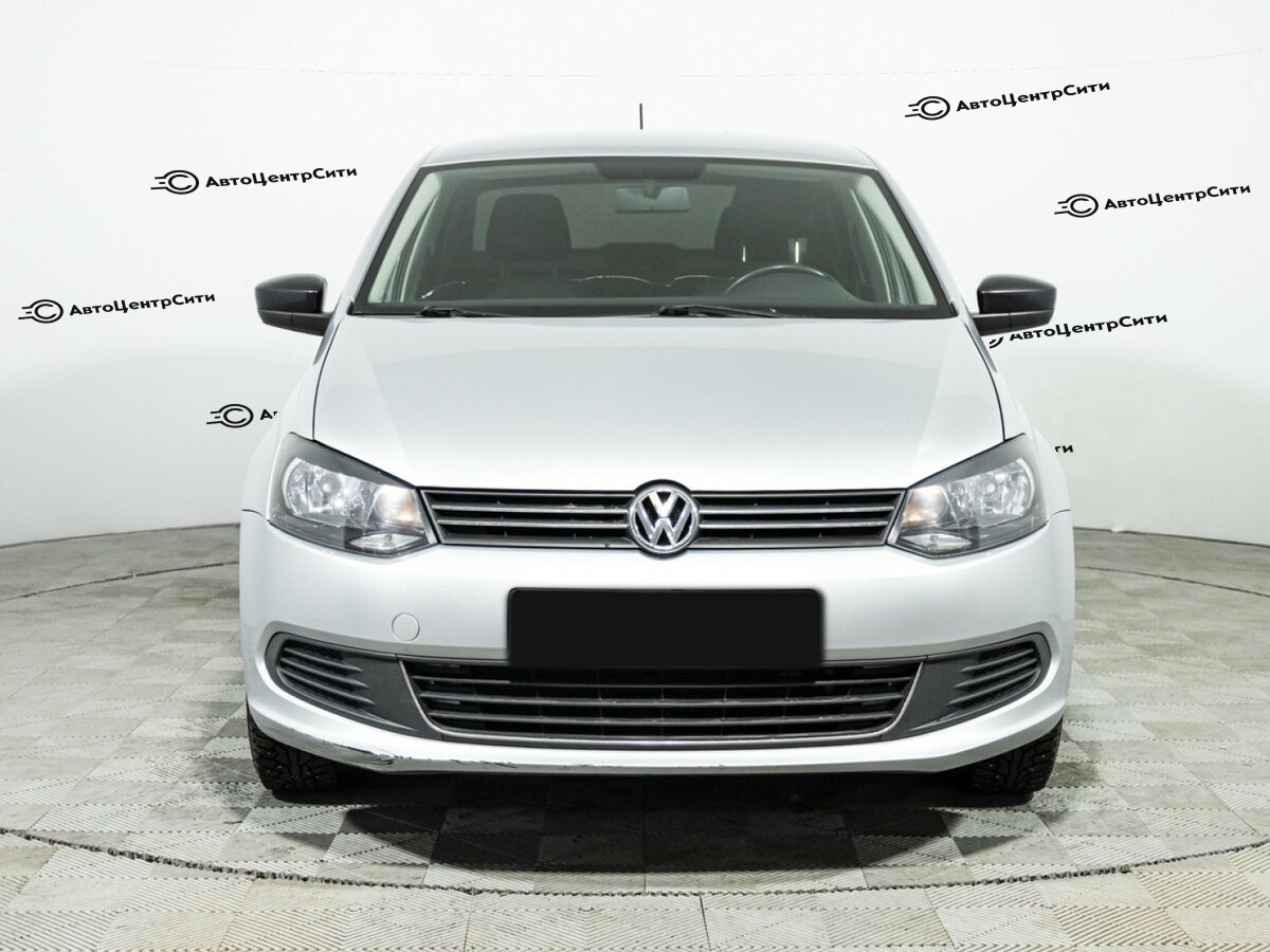 Volkswagen Polo с пробегом — 2013 год. Фото: #1