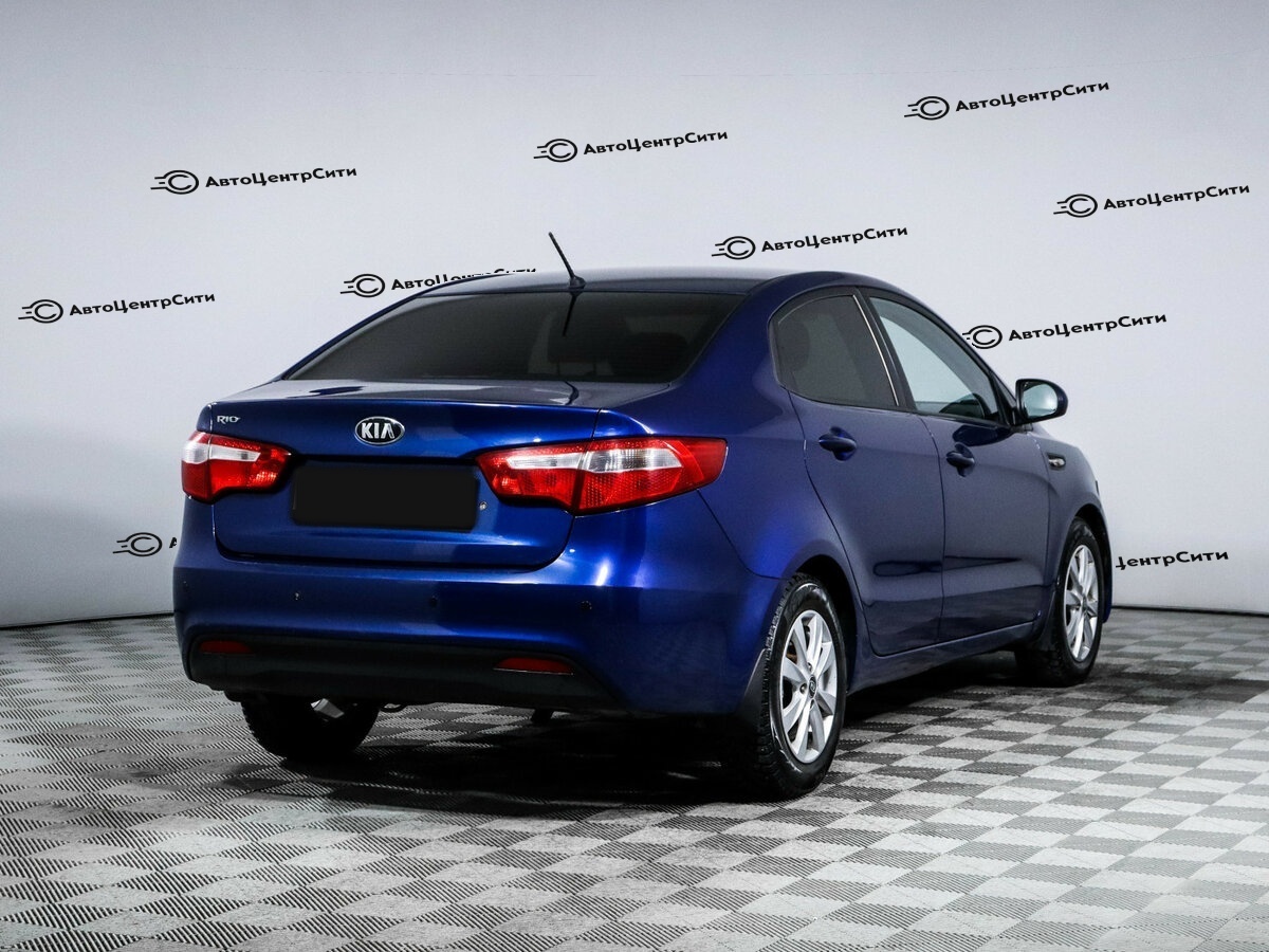 Kia Rio с пробегом — 2015 год. Фото: #2