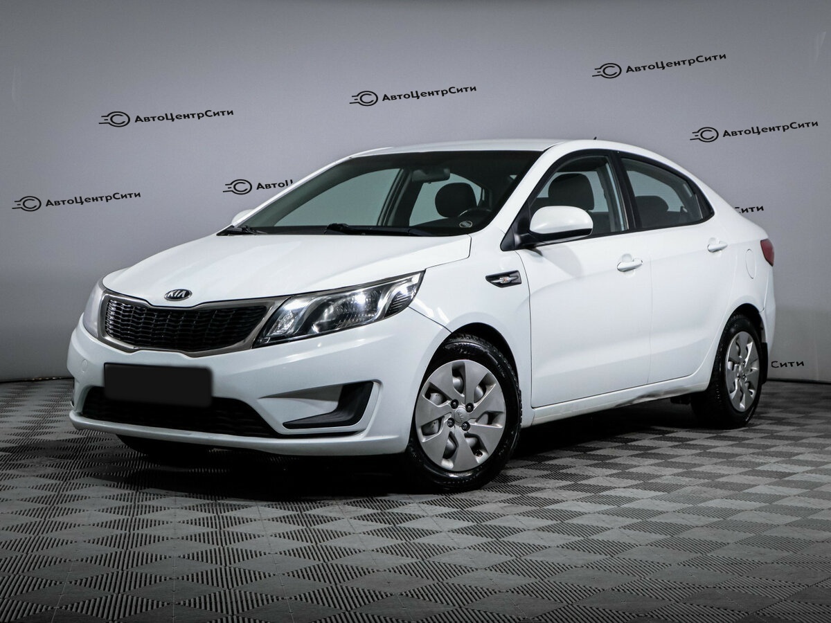 Kia Rio с пробегом — 2014 год. Фото: #0