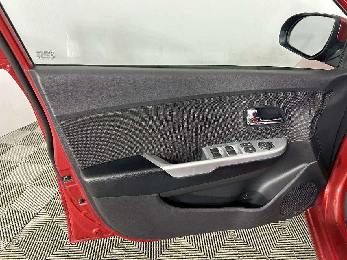 Kia Rio с пробегом — 2013 год. Фото: #7