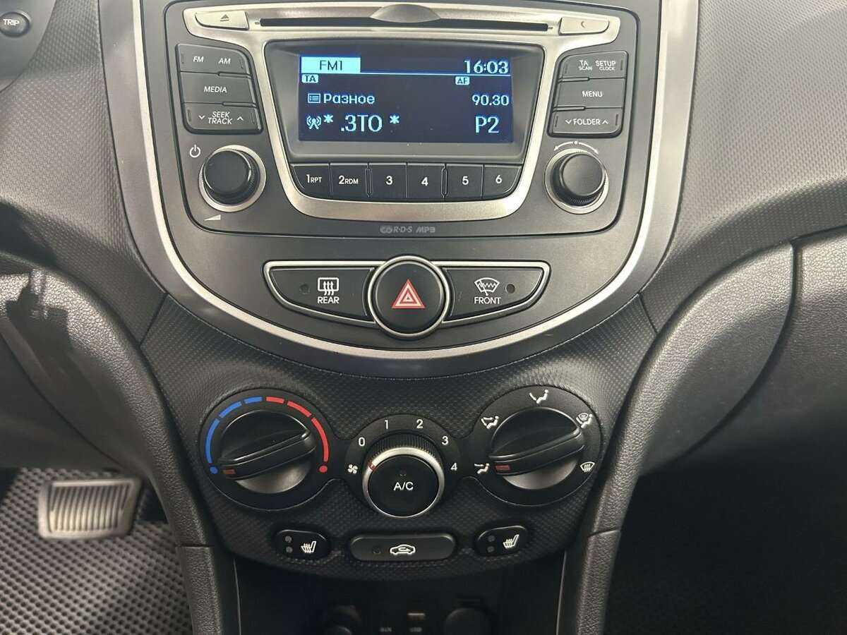 Hyundai Solaris с пробегом — 2015 год. Фото: #11