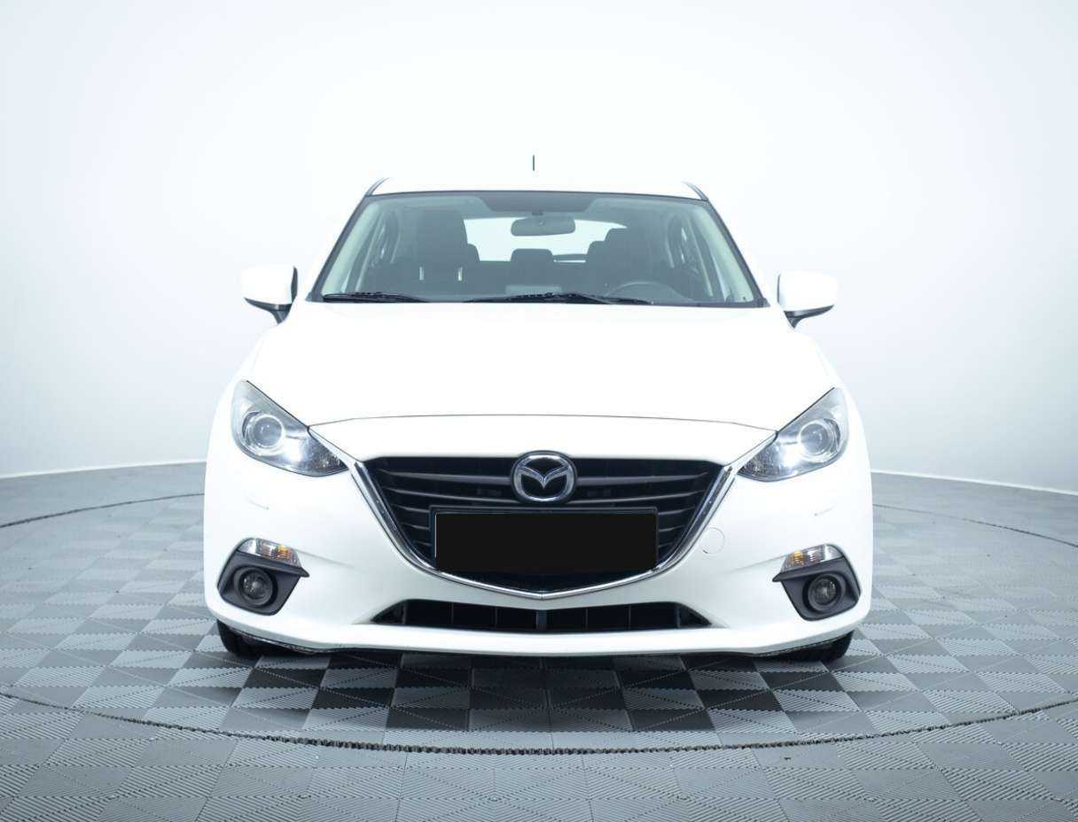 Mazda 3 с пробегом — 2014 год. Фото: #1