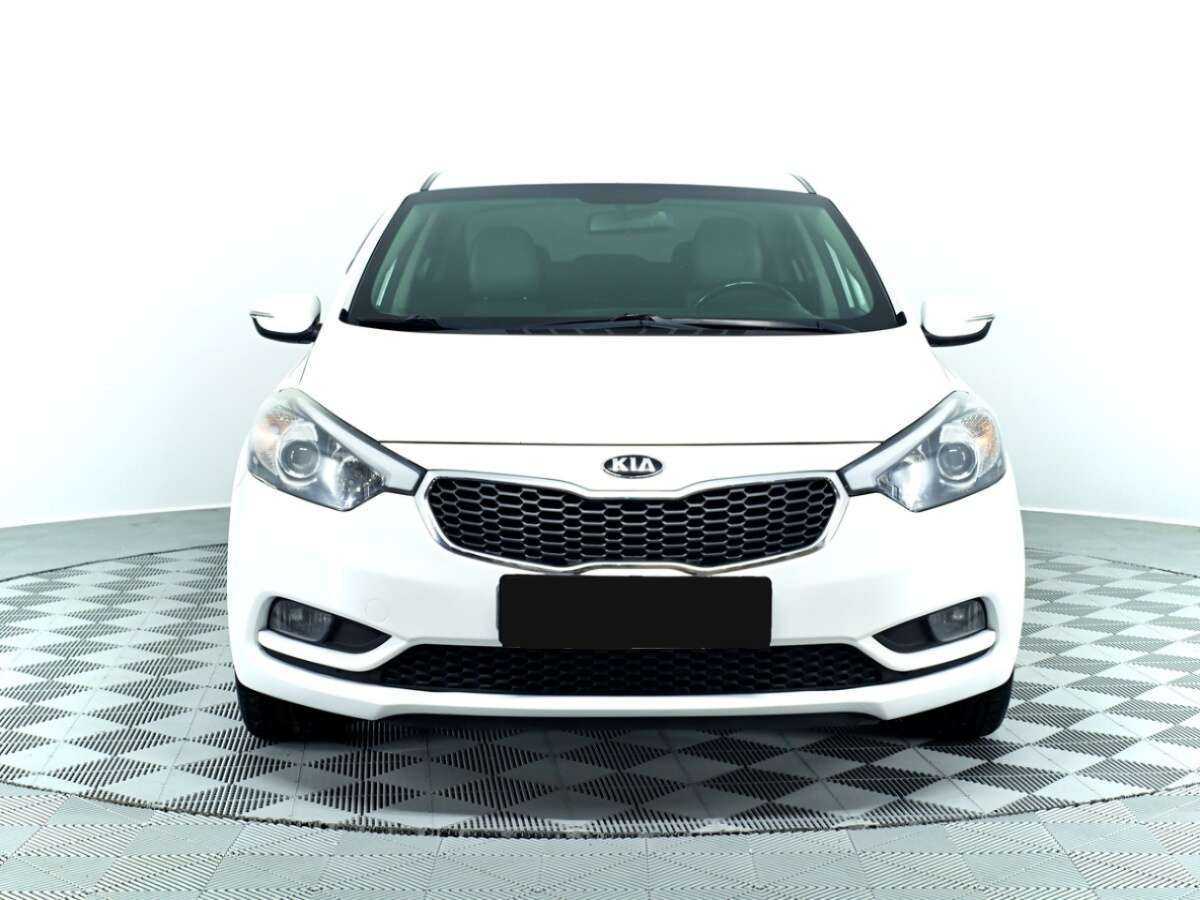 Kia Cerato с пробегом — 2014 год. Фото: #1