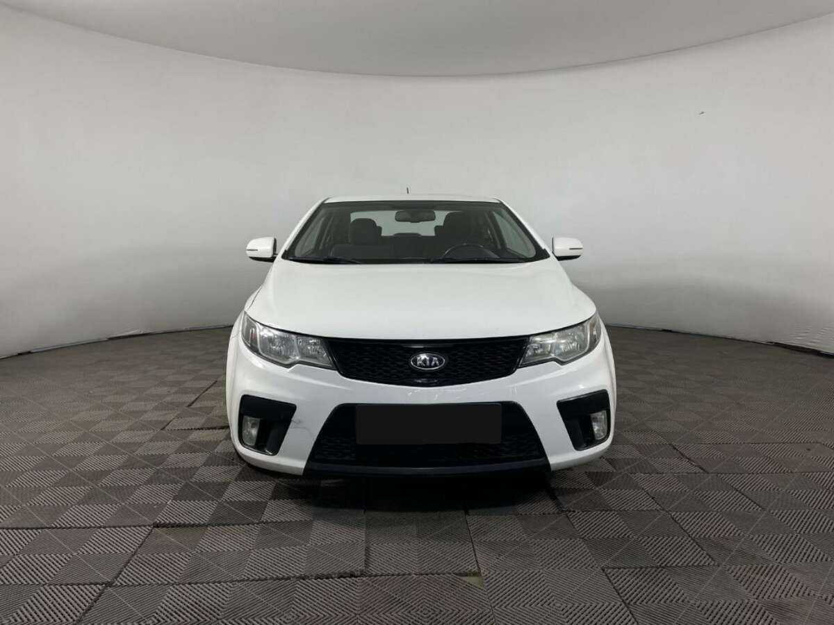 Kia Cerato с пробегом — 2012 год. Фото: #1