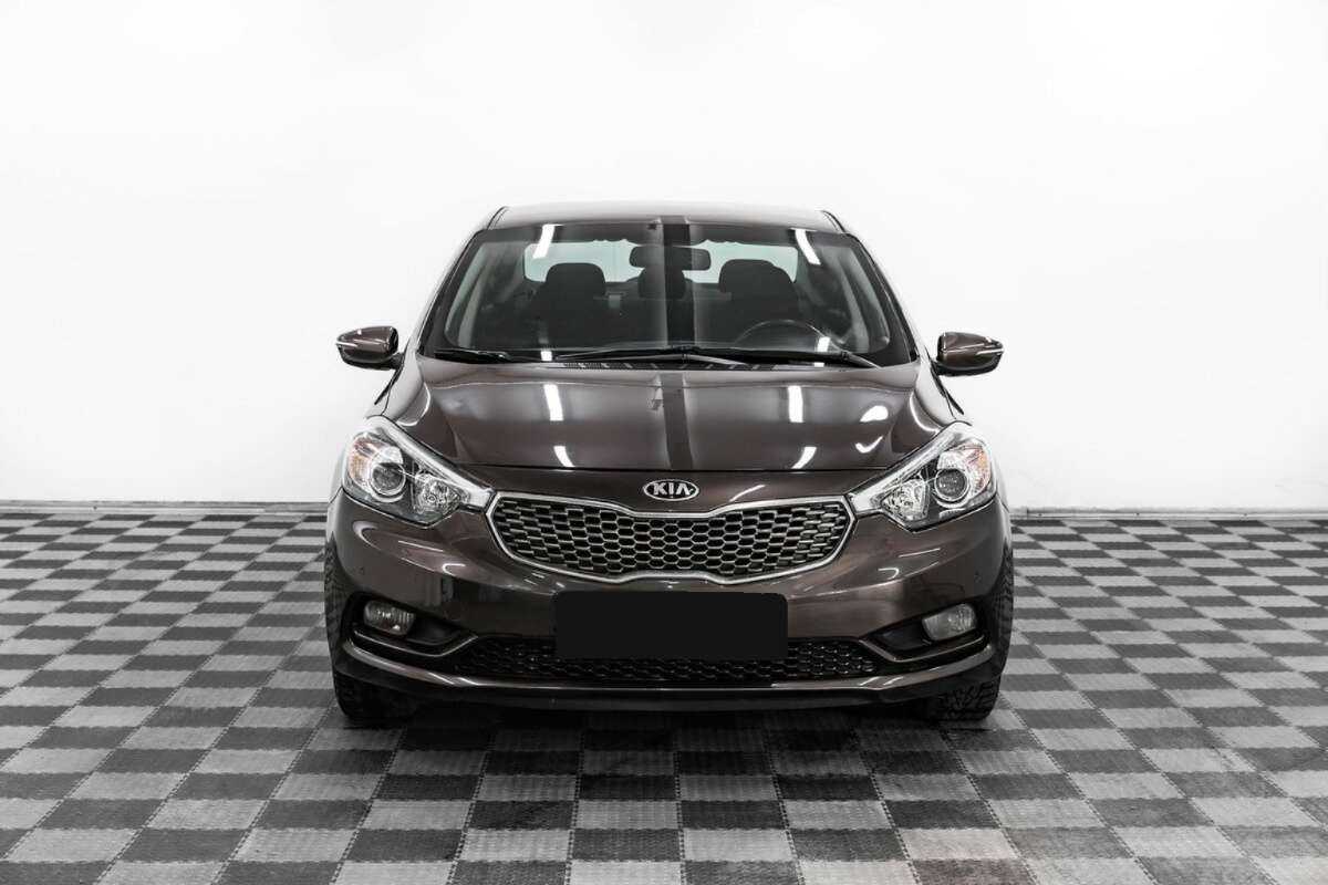 Kia Cerato с пробегом — 2013 год. Фото: #1