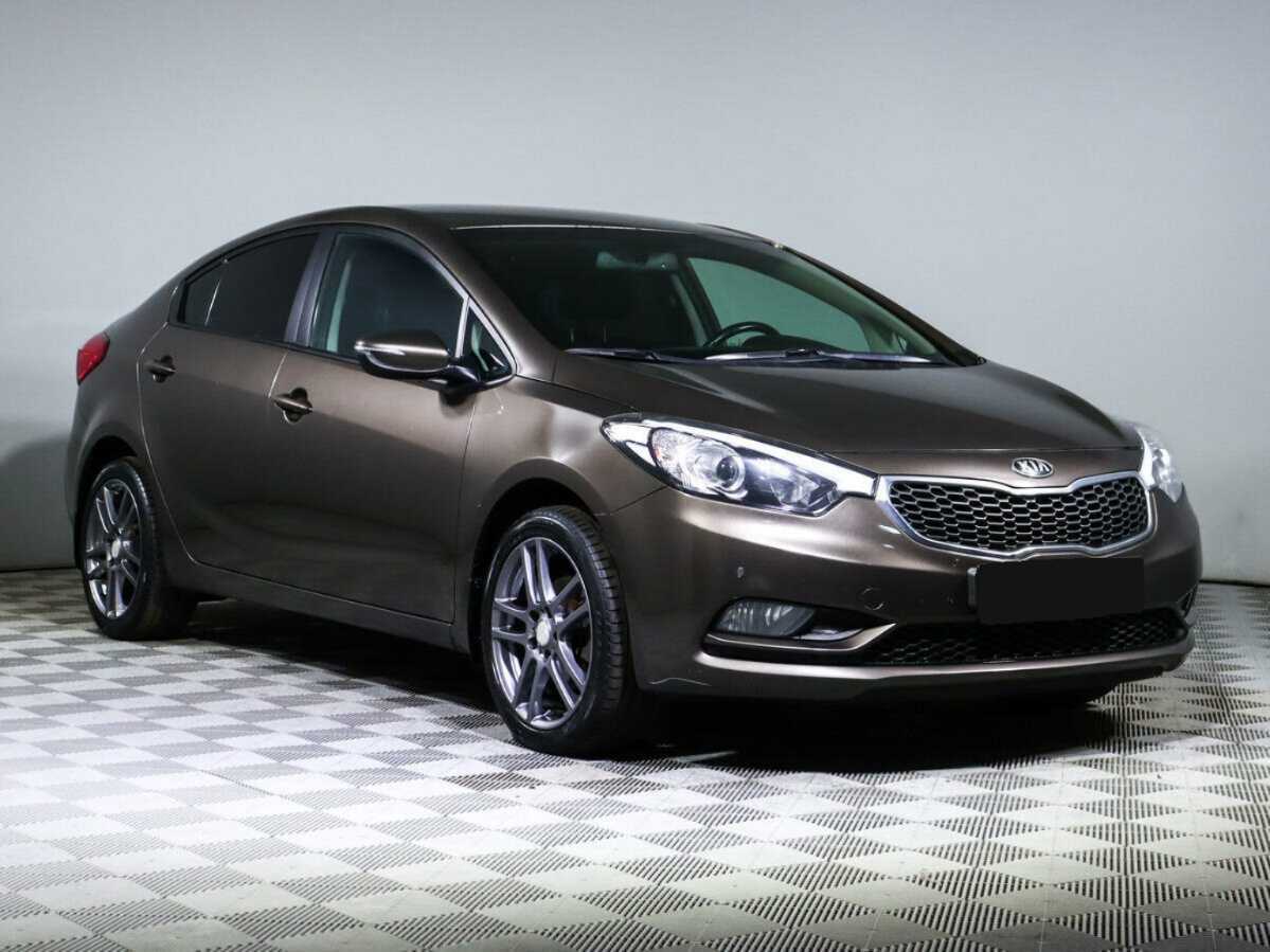 Kia Cerato с пробегом — 2015 год. Фото: #2