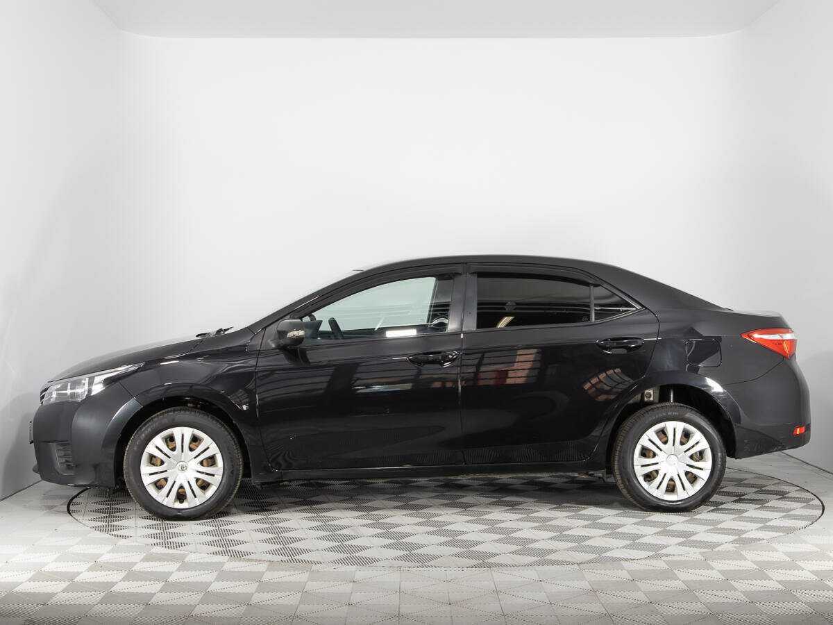 Toyota Corolla с пробегом — 2014 год. Фото: #7