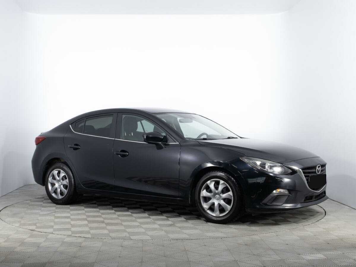 Mazda 3 с пробегом — 2014 год. Фото: #2