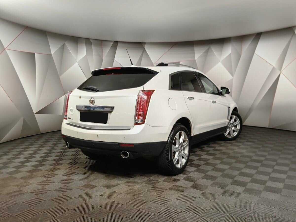 Cadillac SRX с пробегом — 2014 год. Фото: #1