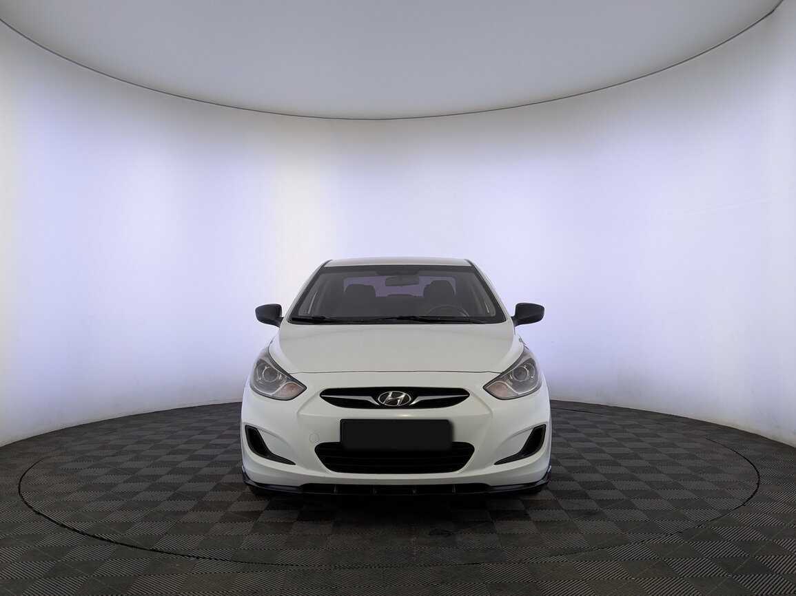 Hyundai Solaris с пробегом — 2013 год. Фото: #1