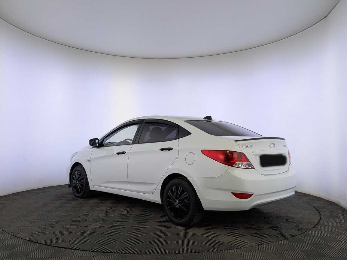 Hyundai Solaris с пробегом — 2013 год. Фото: #6