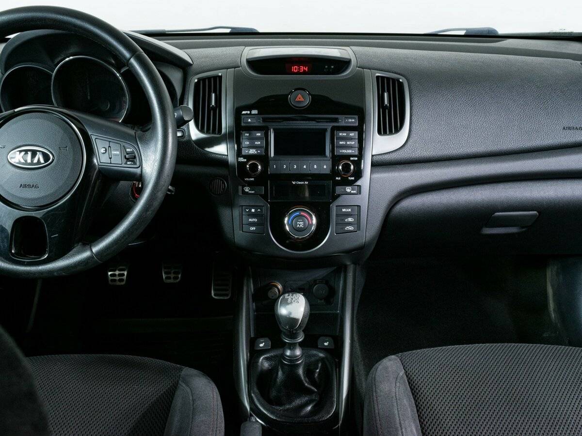 Kia Cerato с пробегом — 2012 год. Фото: #10