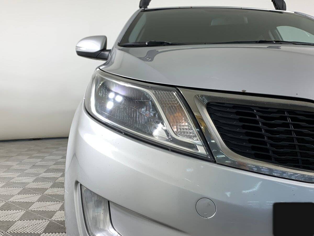 Kia Rio с пробегом — 2013 год. Фото: #9