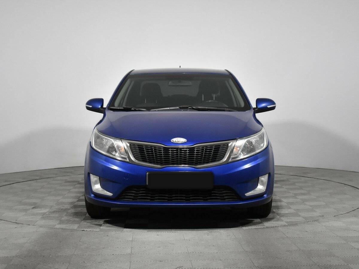 Kia Rio с пробегом — 2013 год. Фото: #1