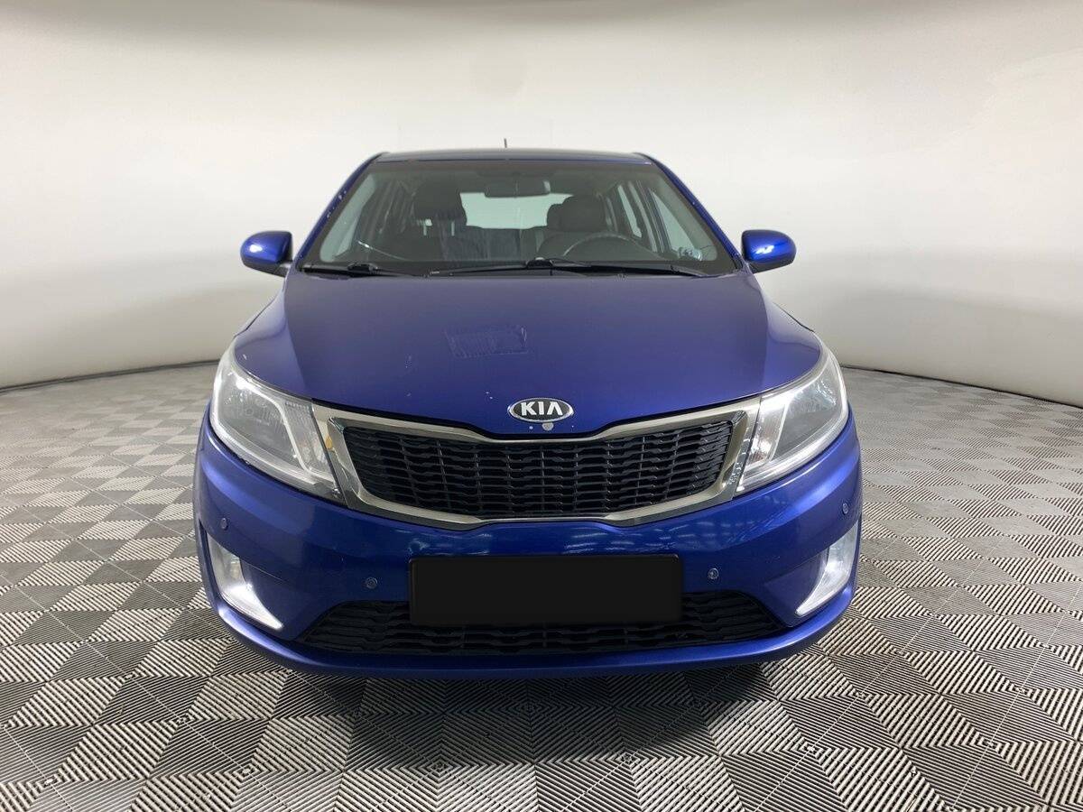Kia Rio с пробегом — 2013 год. Фото: #1